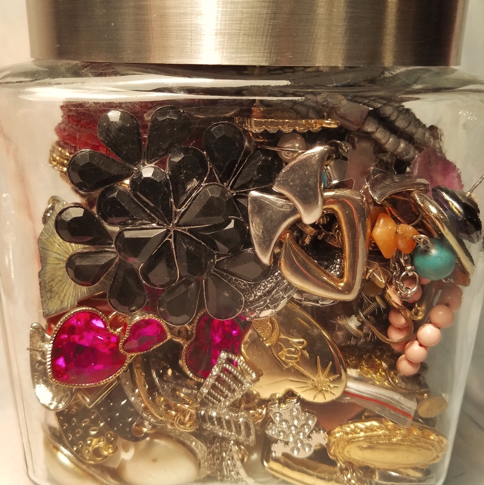 Canister full of jewelry